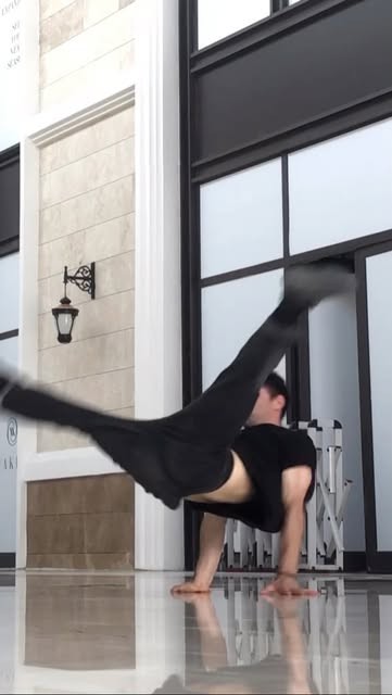 Orkhan mid-air in a breaking power move